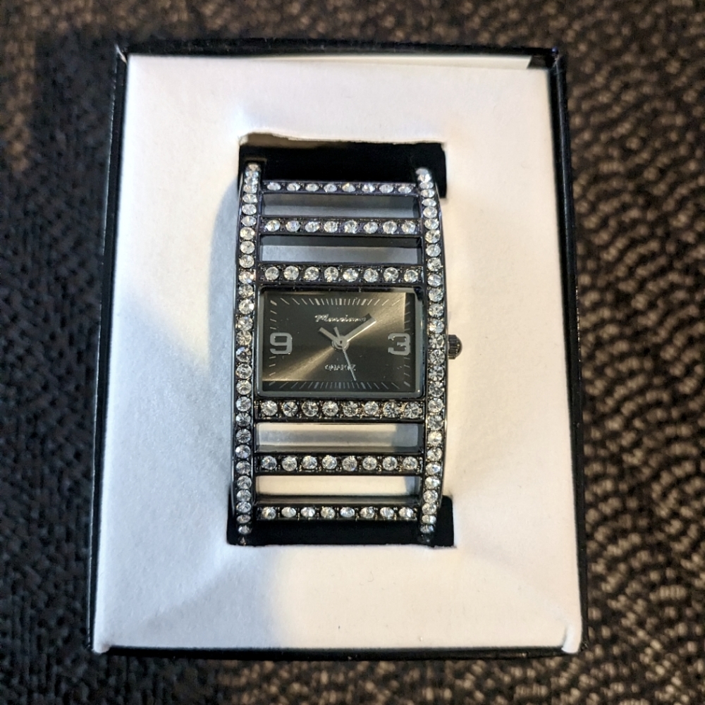 Silver and jewel watch